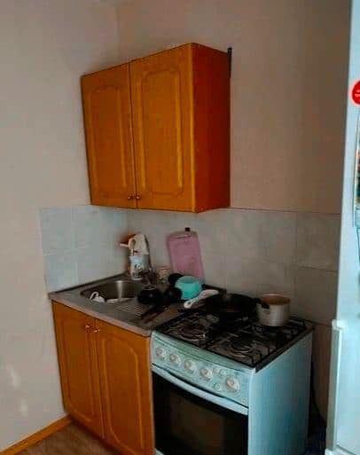 While his wife was at work the man spent 170 dollars and totally remade their miserable kitchen